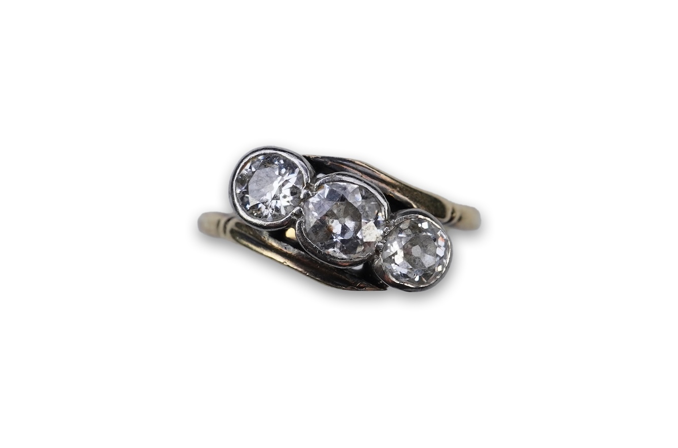A three-stone diamond ring, early 20th century